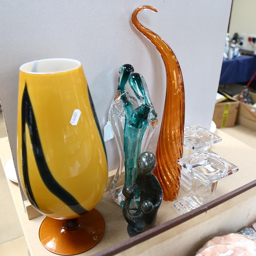 612 - Art glass couple, 34cm, glass candle stands, soapstone group etc