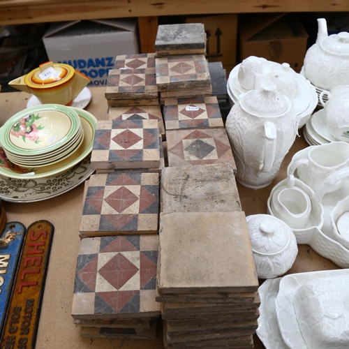 632 - A collection of floor tiles, by the Architectural Pottery Co Poole Dorset, various designs, 10cm squ... 
