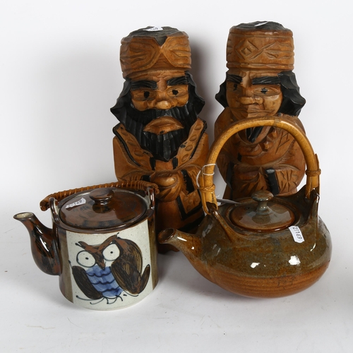 640 - A teapot in the manner of Bernard Leach, height 23cm overall, a teapot with owl decoration, and a pa... 