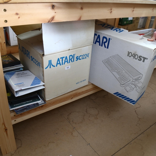 643 - An Atari 1040 ST computer and SC1224 colour monitor, keyboard, manuals etc