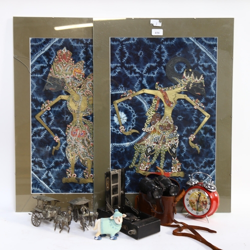 656 - Pair of Indian paper/card shadow puppets, mounted on fabric backgrounds, clip frames, overall 70cm x... 