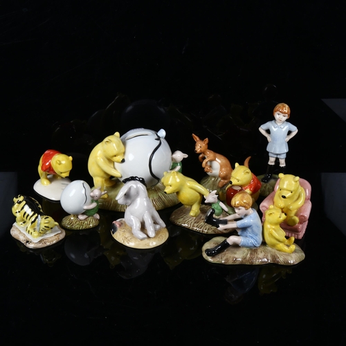 489 - A group of Royal Doulton Winnie The Pooh figures, and matching money box