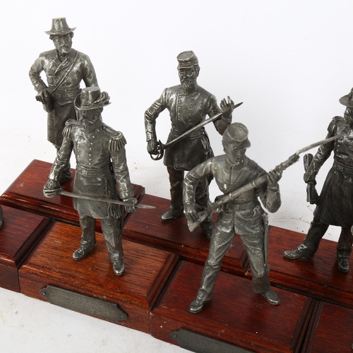493 - A set of 8 pewter military figures, on wooden stands, height 14cm approx