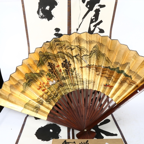 495 - 2 boxed Japanese scrolls, width 36cm, another scroll, and a large decorative fan, with painted and g... 