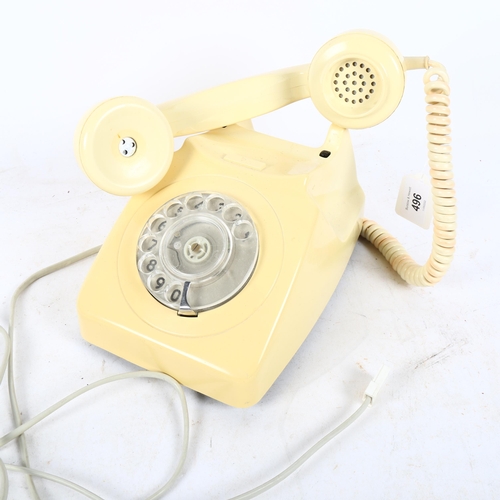496 - A 1960s plastic dial telephone