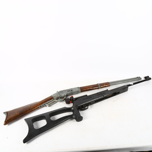 498 - An American .177 calibre air rifle, and an Italian replica Winchester rifle