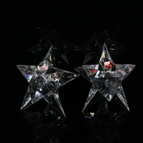501 - VICKE LINDSTRAND for Rosenthal, a pair of glass star candle holders, in original boxes, height 10cm