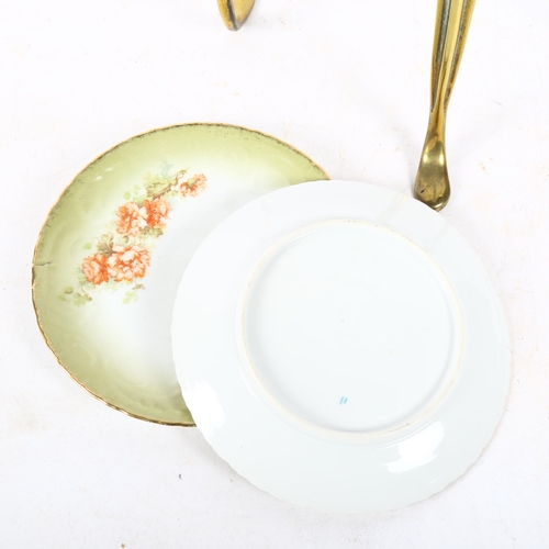 503 - A brass cake stand with 3 porcelain plates, height 73cm