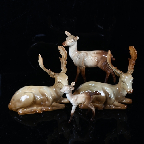 512 - 2 Beswick recumbent stag figures, 954, Beswick deer and Beswick doe (4)