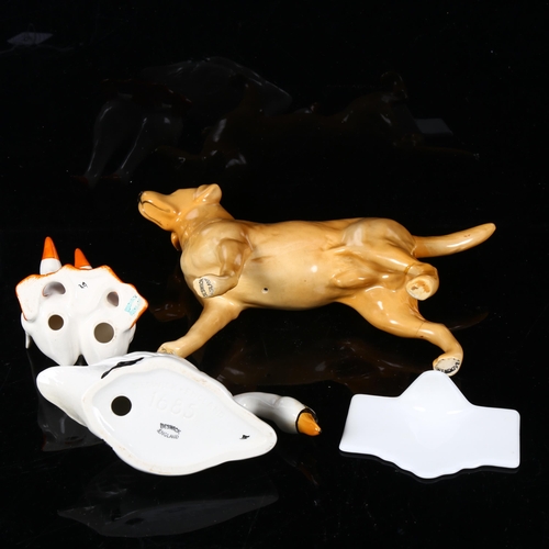 516 - A Beswick Golden Labrador, a pair of geese, a swan, and a Beswick sign