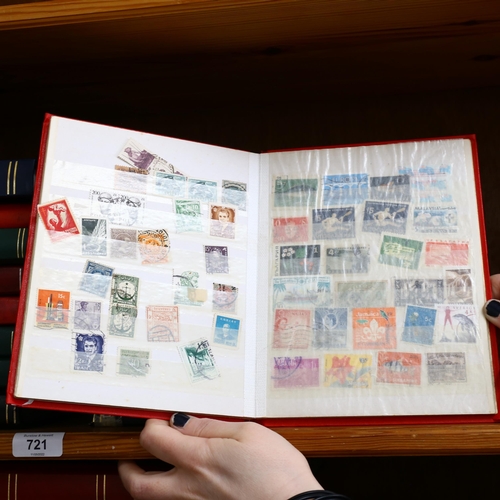 721 - 13 albums of Vintage world postage stamps