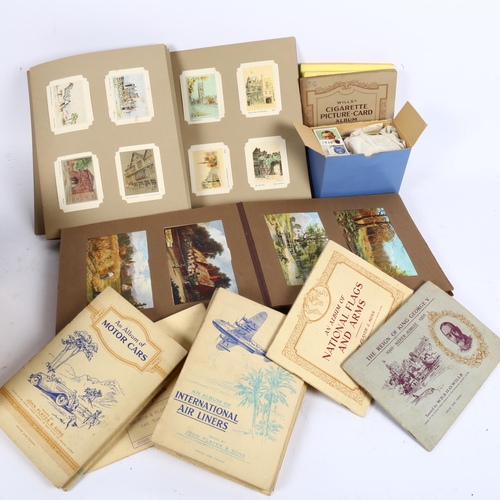 724 - Vintage cigarette cards, Edwardian East Sussex postcard album etc
