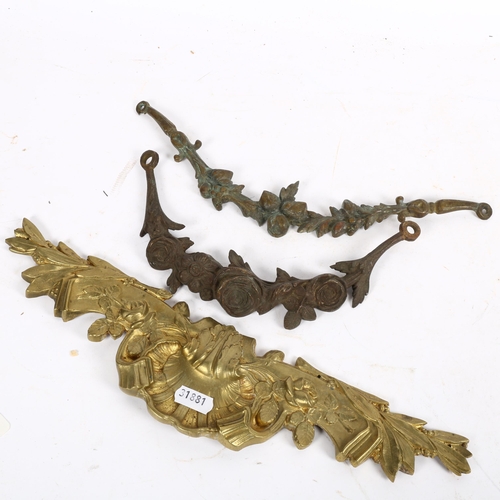 750 - 3 Antique brass furniture mounts, largest width 35cm