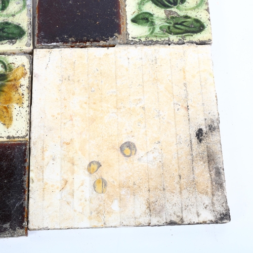 762 - 12 Art Nouveau floral pottery tiles, 16cm x 16cm