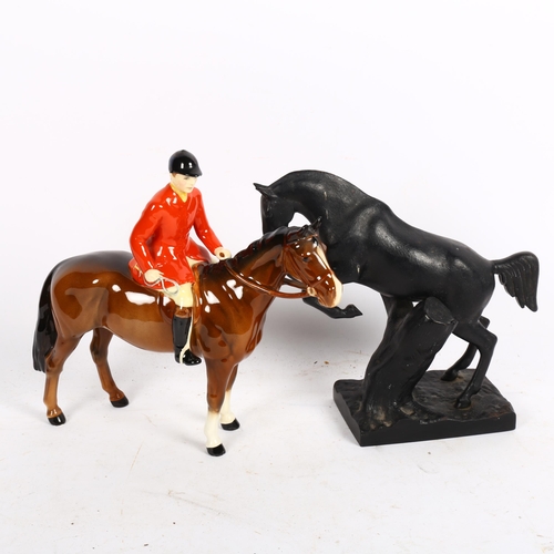 767 - Beswick porcelain foxhunting figure, and a Russian cast-iron horse sculpture, height 18cm (2)