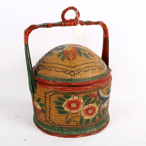 773 - A painted wicker sewing basket and contents, height 38cm overall