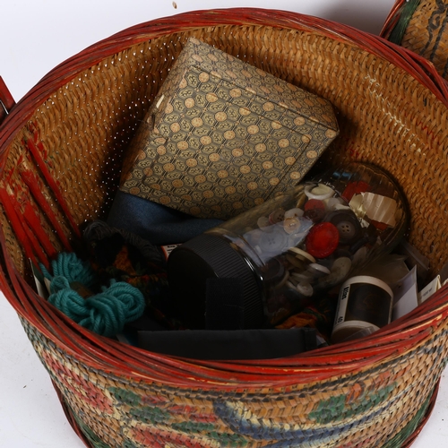 773 - A painted wicker sewing basket and contents, height 38cm overall