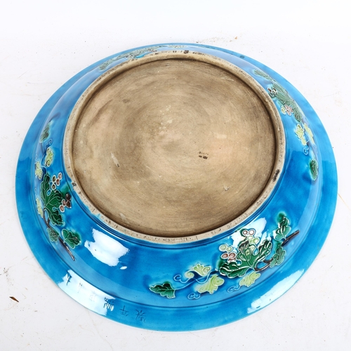 797 - Oriental pottery charger with tube-lined enamel decoration, 38cm