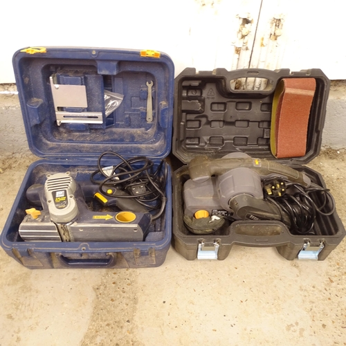 2778 - A Pro 3-blade planer, in case, and a Titan belt sander, in case