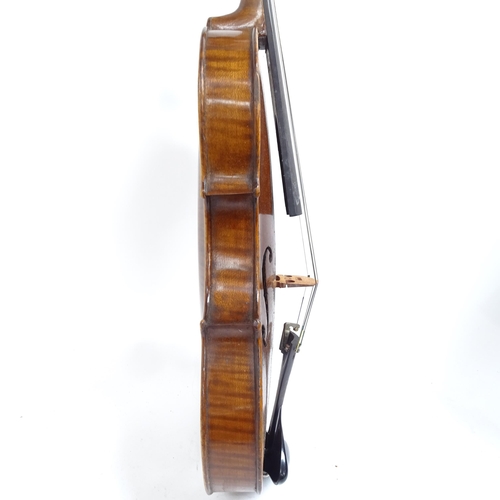 347 - A Vintage violin, globe sticker inside, body length 36cm, with bow, in hardshell case