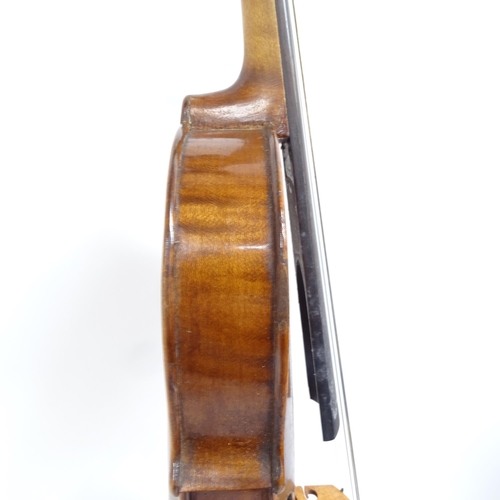 347 - A Vintage violin, globe sticker inside, body length 36cm, with bow, in hardshell case