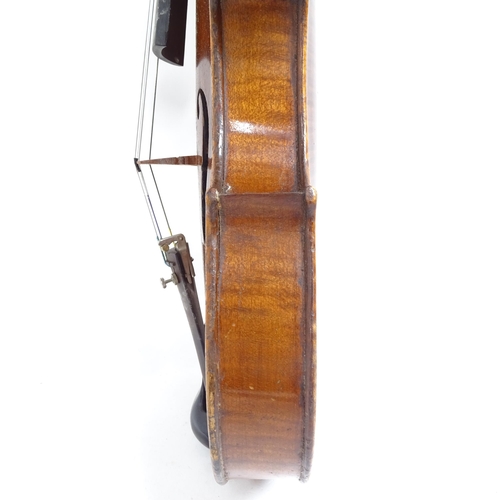 347 - A Vintage violin, globe sticker inside, body length 36cm, with bow, in hardshell case