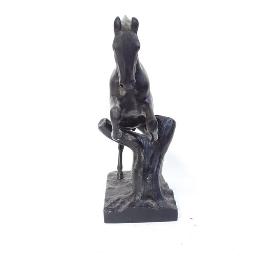 767 - Beswick porcelain foxhunting figure, and a Russian cast-iron horse sculpture, height 18cm (2)