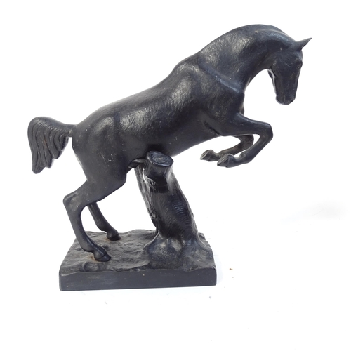 767 - Beswick porcelain foxhunting figure, and a Russian cast-iron horse sculpture, height 18cm (2)