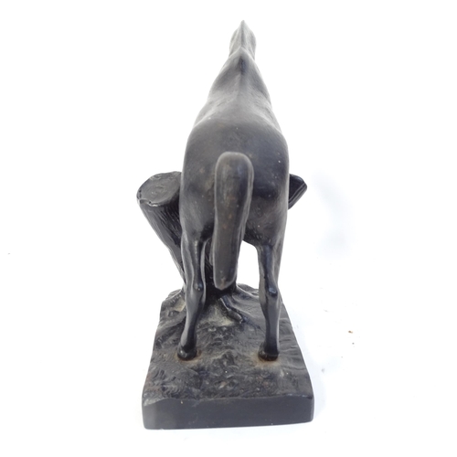 767 - Beswick porcelain foxhunting figure, and a Russian cast-iron horse sculpture, height 18cm (2)