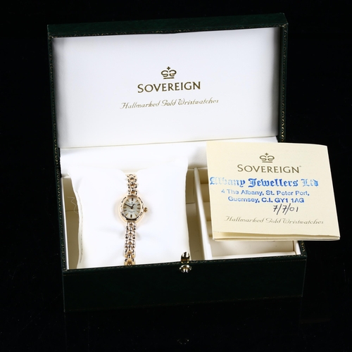 63 - SOVEREIGN - a lady's 9ct gold quartz bracelet watch, champagne dial with gilt baton hour markers and... 