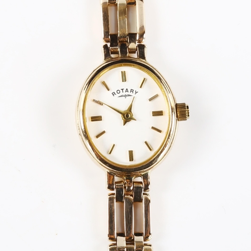 64 - ROTARY - a lady's 9ct gold quartz bracelet watch, white dial with gilt baton hour markers and 9ct br... 