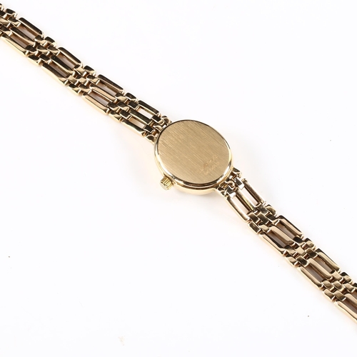 64 - ROTARY - a lady's 9ct gold quartz bracelet watch, white dial with gilt baton hour markers and 9ct br... 