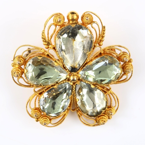 100 - A 19th century chrysoberyl flowerhead brooch, unmarked gold wirework cannetille decoration with pear... 