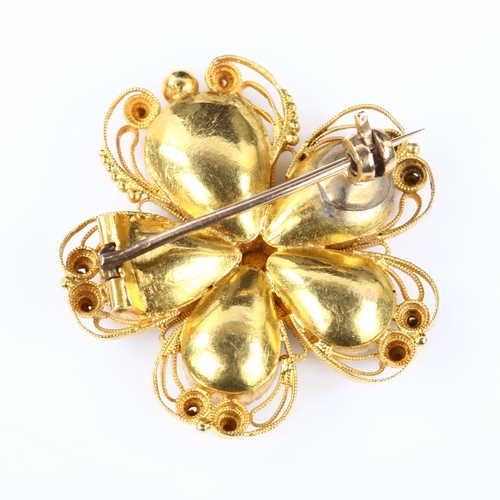 100 - A 19th century chrysoberyl flowerhead brooch, unmarked gold wirework cannetille decoration with pear... 