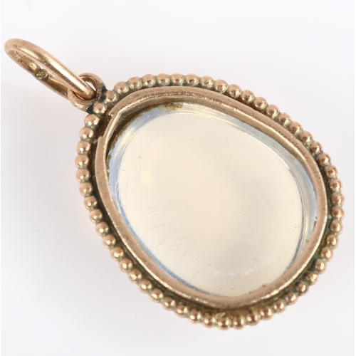 115 - A Scandinavian moonstone pendant, unmarked gold beadwork frame with oval cabochon moonstone, pendant... 