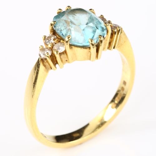 117 - A late 20th century 18ct gold blue zircon and diamond dress ring, set with oval mixed-cut zircon and... 