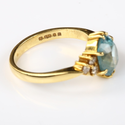 117 - A late 20th century 18ct gold blue zircon and diamond dress ring, set with oval mixed-cut zircon and... 