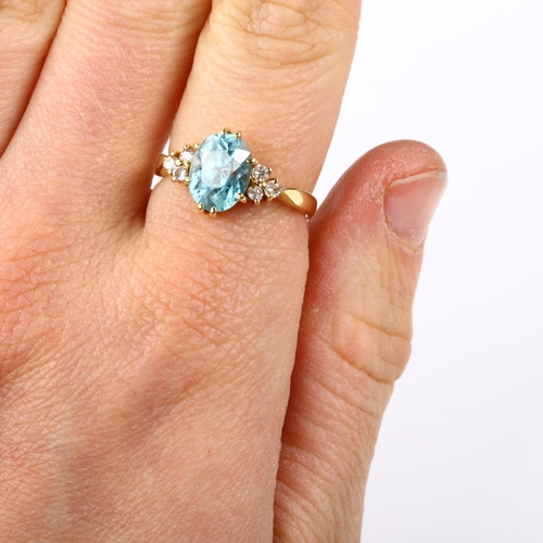 117 - A late 20th century 18ct gold blue zircon and diamond dress ring, set with oval mixed-cut zircon and... 