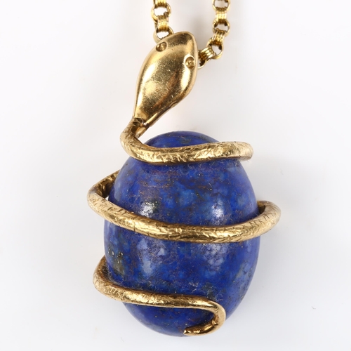 118 - An unmarked gold lapis lazuli coiled snake/serpent pendant necklace, set with oval cabochon lapis an... 