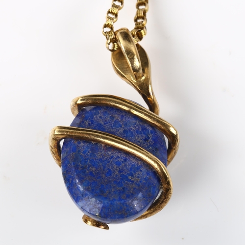 118 - An unmarked gold lapis lazuli coiled snake/serpent pendant necklace, set with oval cabochon lapis an... 