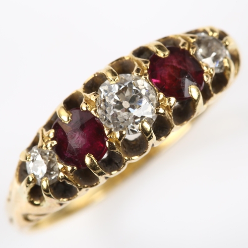 125 - An 18ct gold graduated five stone garnet and diamond half hoop ring, set with round-cut garnets and ... 