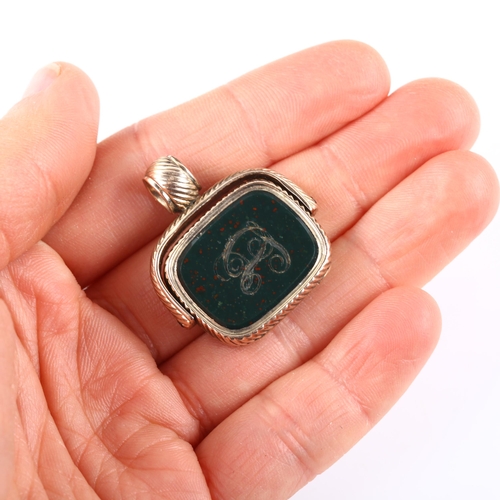 128 - An early 19th century unmarked rose gold bloodstone swivel seal memorial fob, with hinged panel open... 