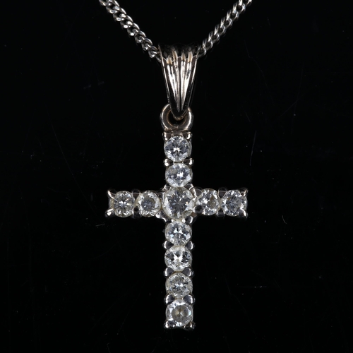 130 - A modern 18ct white gold diamond cross pendant necklace, on 18ct fine curb link chain, pendant heigh... 