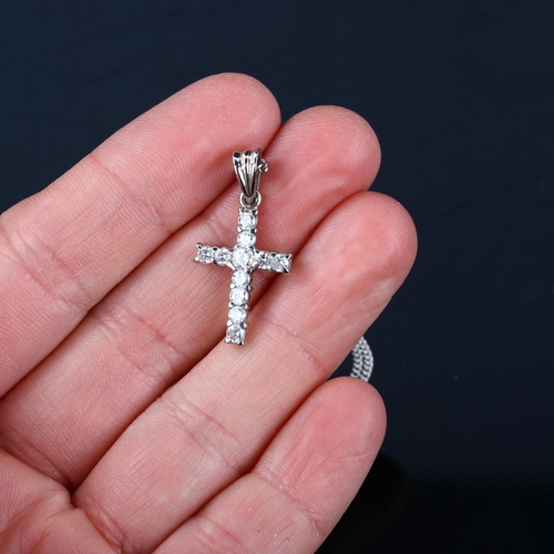 130 - A modern 18ct white gold diamond cross pendant necklace, on 18ct fine curb link chain, pendant heigh... 