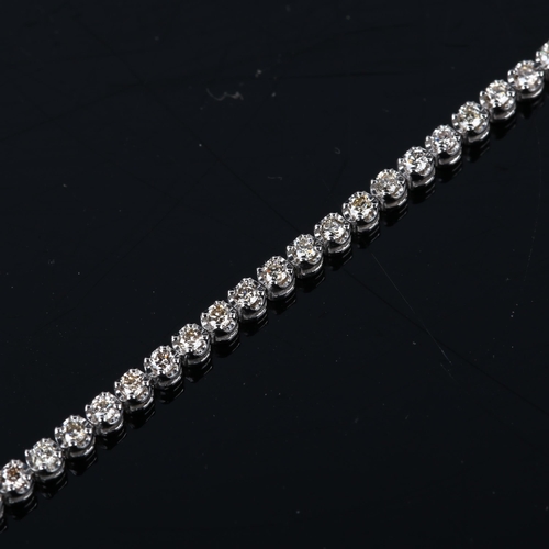 131 - A modern 18ct white gold diamond tennis line bracelet, set with modern round brilliant-cut diamonds,... 