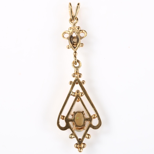 134 - An Edwardian style opal openwork pendant, unmarked gold settings with cabochon opals, pendant height... 