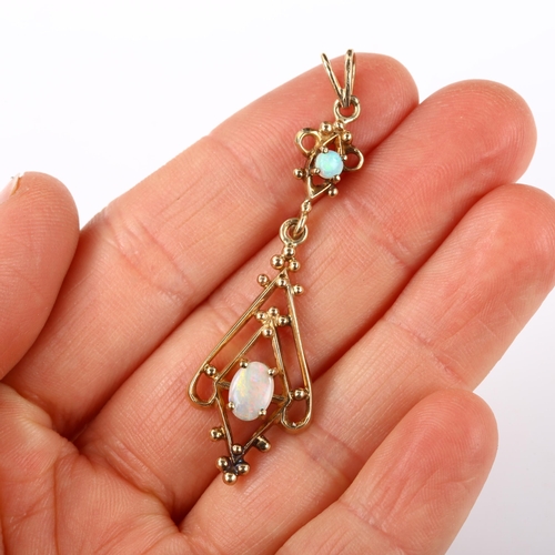 134 - An Edwardian style opal openwork pendant, unmarked gold settings with cabochon opals, pendant height... 