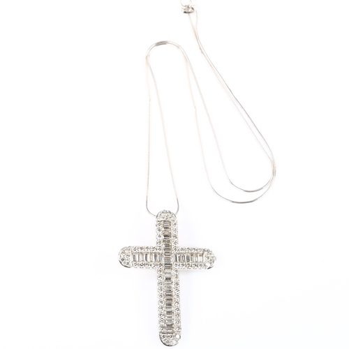 142 - A large modern 18ct white gold diamond cross pendant necklace, set with baguette and modern round br... 