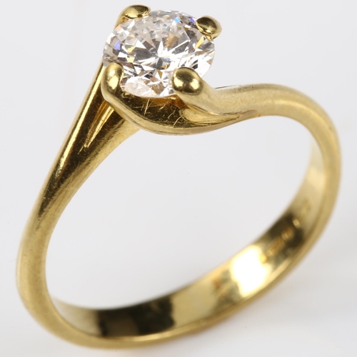 146 - An 18ct gold 0.6ct solitaire diamond ring, crossover claw set with modern round brilliant-cut diamon... 