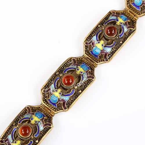 150 - ERIK POUL FENSTER - a Danish silver-gilt enamel and carnelian chinoiserie bat panel bracelet, bracel... 